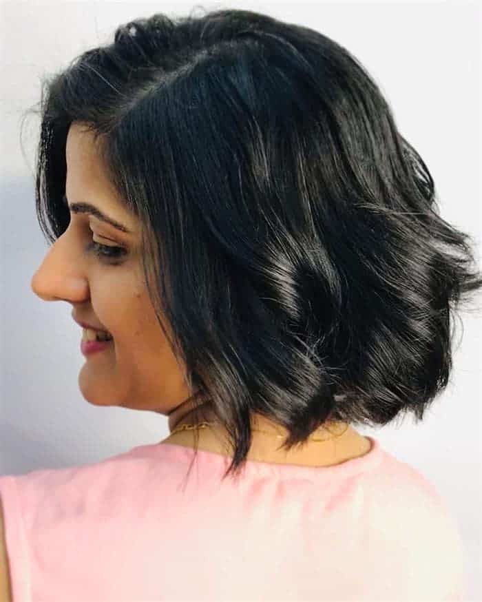corte de cabelo feminino com franja lateral